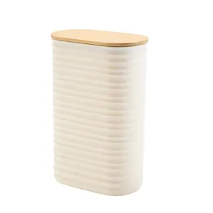 Plastic storage canister with bamboo lid, elegant vertical striped container for home decor.