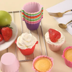 Colorful silicone muffin baking cups, double-ear cake molds for air fryer and kitchen baking.