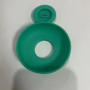 Green silicone ice cream drip guard detail view, anti-melt popsicle holder part.