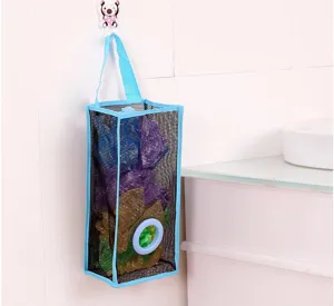 Close-up view of hanging mesh grocery bag holder highlighting breathable fabric and dispensing hole.