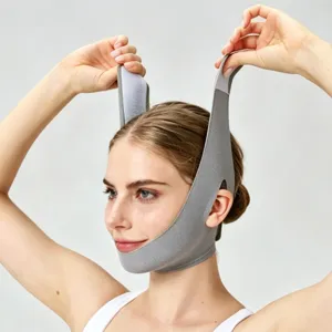 Detail shot of breathable V-line face lifting bandage with adjustable velcro straps.