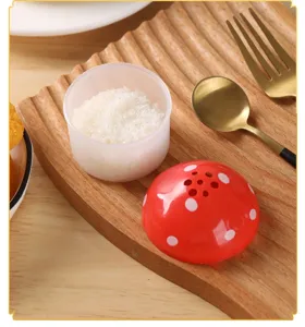 Cute mushroom seasoning jar detail showing creative salt pepper container and mini portable box.