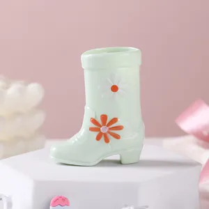 Cute daisy flower boot shaped ceramic cup and vase, pastel green creative home decor item.