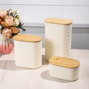 Plastic storage jar set with bamboo lid, ribbed oval container for kitchen organization and home decor.