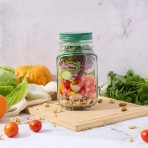 Plastik Salat Aufbewahrungsglas mit auslaufsicherem grünen Deckel für gesunde Mahlzeiten.