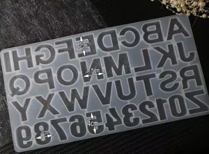Silicone mold featuring alphabet letters and numbers for DIY crafts, resin, and baking details.