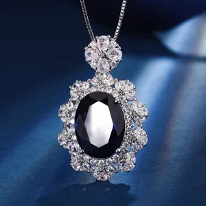 Close-up of a stunning vintage-style blue gemstone pendant with sparkling zirconia halo and silver chain.
