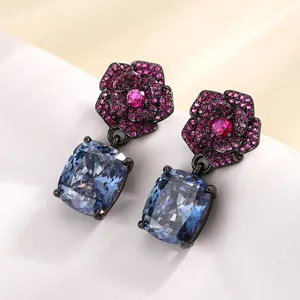Exquisite black gold plated camellia cushion cut blue crystal dangle earrings detail.