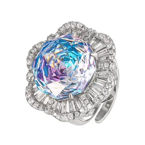 Exquisite millennium-cut gradient crystal ring with sparkling pave stones, luxury design.