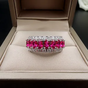 Vintage wide multi-row red gemstone ring with sparkling cubic zirconia, elegant jewelry main image.