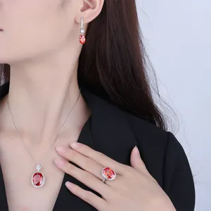 Elegant copper gold-plated simulated red gemstone jewelry set featuring necklace and earrings.