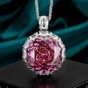 Exquisite rose-cut pink gemstone pendant necklace with dazzling white crystals for elegant style.