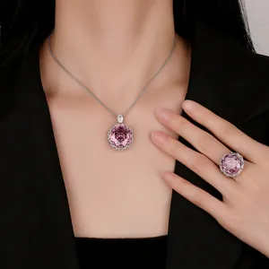 Stunning rose cut pink gemstone jewelry set including pendant necklace and matching elegant ring.
