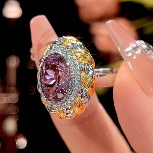 Detailed view of vintage multi-layer bird nest ring with purple oval gemstone and brushed finish.