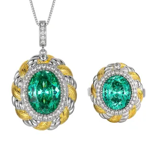 Two-tone twisted cable jewelry set with oval green gemstone and diamond halo pendant and ring