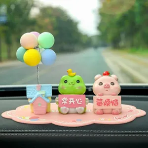 Cute car dashboard ornament set, resin cartoon animal figures with cloud mat for auto decor.