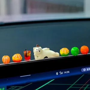Cute resin cat and miniature fruit car dashboard ornaments, creative interior decor items.