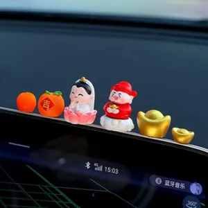 Miniature car dashboard ornaments set featuring lucky fortune gods and ingots for interior decor.