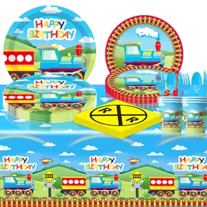 Train birthday party tableware set including paper plates, cups, napkins and table cloth.