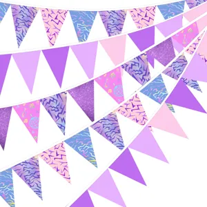 Close-up detail of purple and pink holographic triangle bunting flags for party decor and disco vibe.