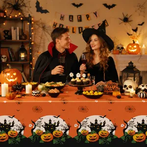 Halloween waterproof disposable tablecloth with pumpkin castle print for party decor.