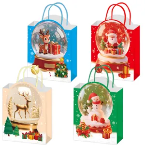 Christmas paper gift bags featuring cute snow globe designs, perfect for holiday gifts.