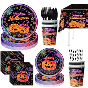 Neon Halloween party tableware set including paper plates cups napkins tablecloth and cutlery.