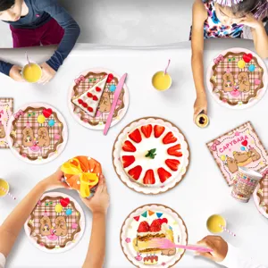 Pink plaid capybara birthday party tableware set including paper plates, cups and napkins.