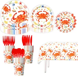 Set di stoviglie usa e getta a tema granchio estivo con piatti, bicchieri e tovaglia.