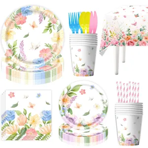 Spring floral butterfly theme birthday party tableware set including paper plates cups and tablecloth.