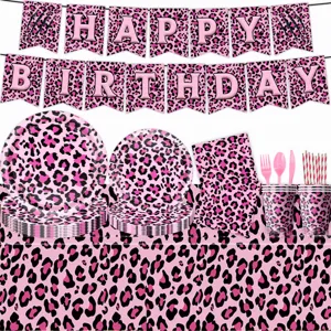 Pink leopard print party tableware detail, decorative plates and cups for birthday.
