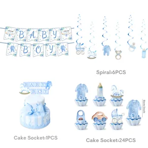 Detail view of blue baby boy party decorations set including banner, cake toppers and swirls.