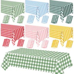 Detailed view of multi-color checkered disposable waterproof tablecloth and matching napkin sets.