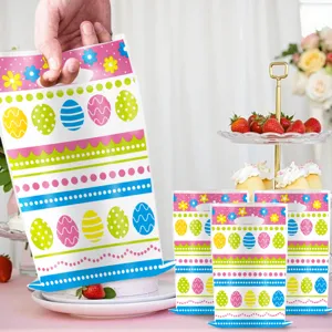 Sachets cadeaux de Pâques avec motifs d'œufs colorés, parfaits pour la fête des enfants.