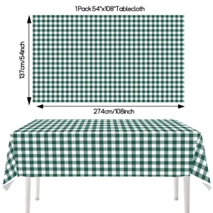 Green and white gingham checkered disposable tablecloth detail, 54x108 inch picnic party decor.