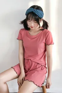Detail view of the summer lettuce-edge modal pajama set, showing soft fabric and fine ribbing.