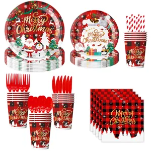 Detailed view of Christmas party tableware set including printed plates, cups, and napkins.