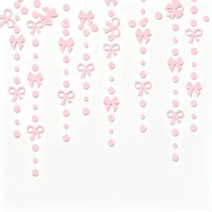 Rosa Schleife und Kreis Papiergirlande Detailaufnahme, ideal für Party Dekoration.