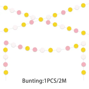Detailed view of pink white and gold glitter paper dot garland party hanging decoration.