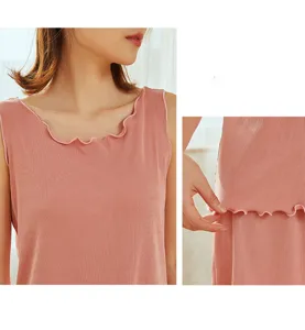 Close-up of pink ribbed tank top with cute lettuce edge trim, breathable summer detail shot.