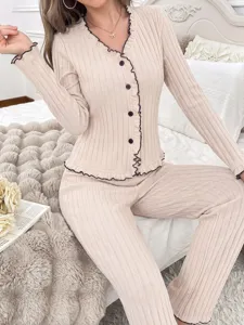 Women ribbed long sleeve button down pajama set detail view, cozy loungewear sleepwear.