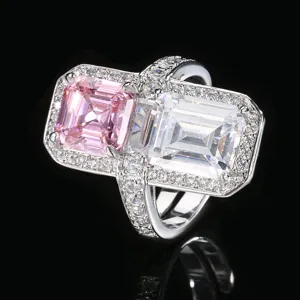 Prachtige dubbele steen ring met roze en witte smaragdgeslepen zirkonia. Elegant.