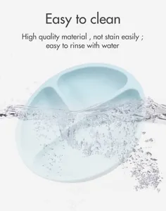 Silicone baby feeding plate with water splash detail, easy to clean partitioned design.