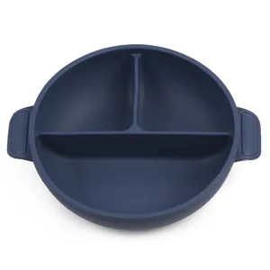 Round silicone divided baby bowl with handles in dark blue, clean main product view.