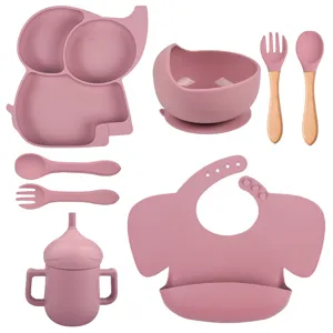 Kit repas bebe en silicone avec assiette elephant, bol, cuillere, fourchette, bavoir, tasse.