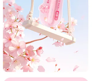 Close-up detail of the pink cherry blossom handle toothbrush with soft bristles and case.
