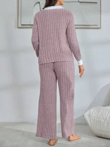 Comfortable women's ribbed knit lounge set featuring long sleeves and wide-leg pants.