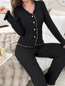 Women's black ribbed long sleeve lounge set with white lettuce trim and button front.