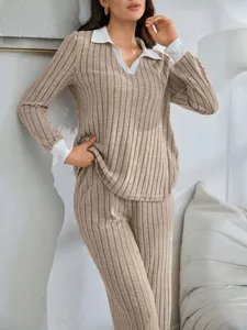 Detail view of women's casual lounge set, ribbed khaki fabric with white contrast collar.