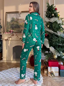 Pyjama de Noël vert pour femme, haut manches longues et pantalon imprimé bonhomme de neige.